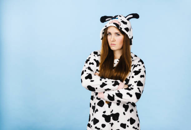 istock Woman wearing pajamas cartoon angry expression 821161612