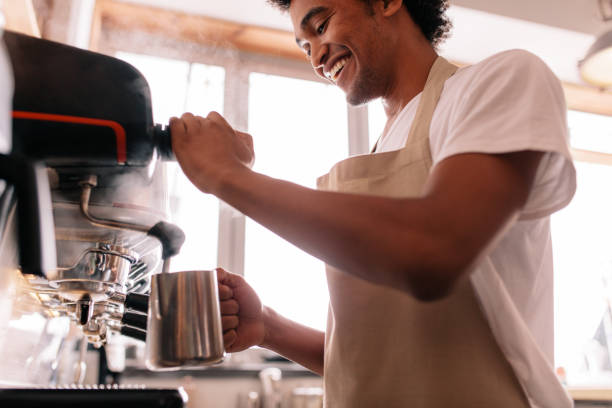 istock Barista making coffee by machine at cafe 821169242