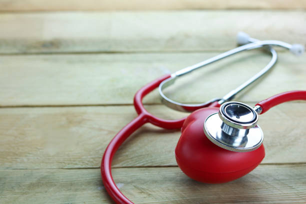 istock Healthy hearth concept, ear doctor on wood background 821169830