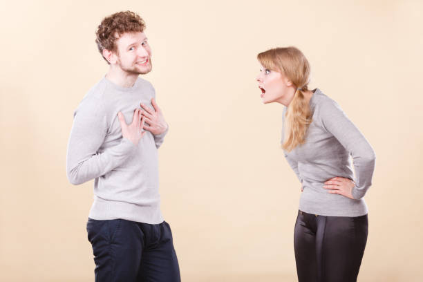 istock Young emotional couple arguing. 821175912