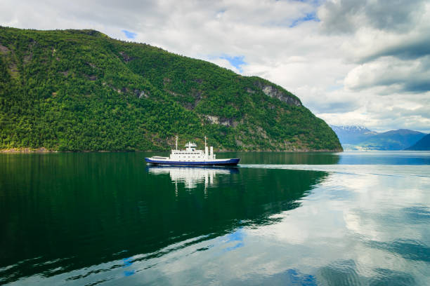 istock Ferry boat ship on fjord in Norway 821176236