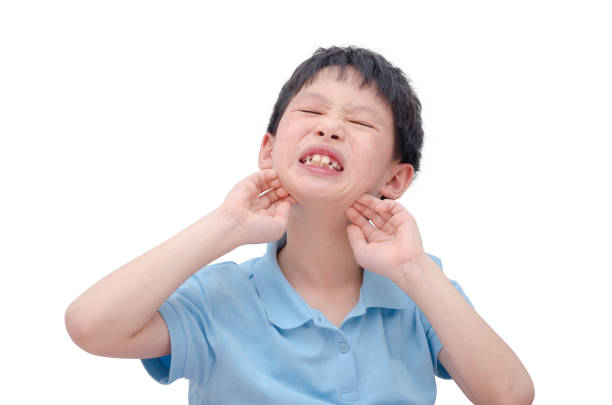 Young asian child scratching skin with rash over white background