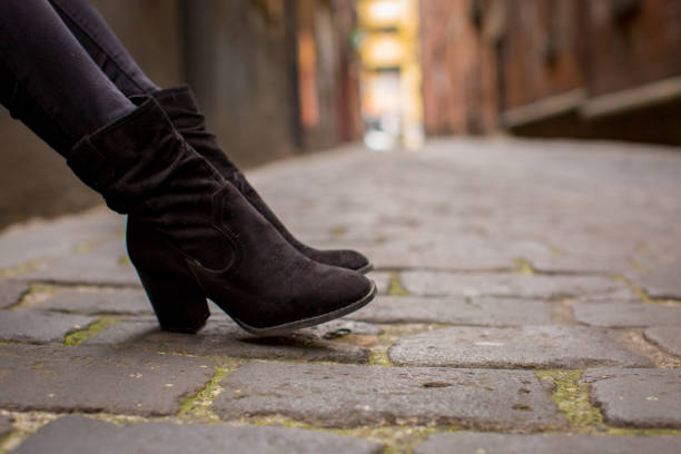 istock Anonymous Woman Sitting in a Lane 821180092