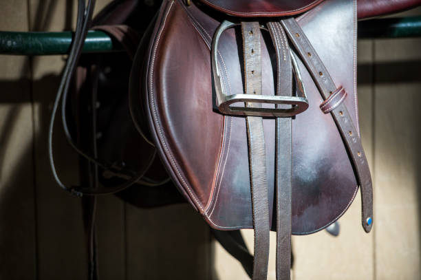 istock Brown sport saddle in the stable 821193724