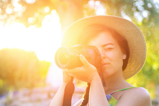 istock Young woman photographing 821193748