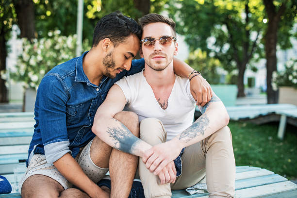 istock Emotional homosexual couple hugging 821194664