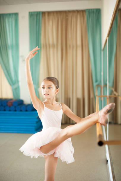 istock Little ballerina in ballet studio 821205304