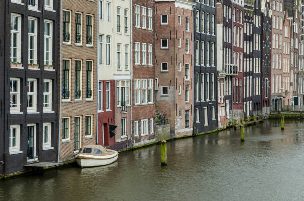 istock Boat parked on an amsterdam canal 821206022
