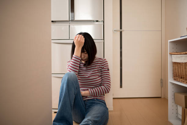 istock depression image of young woman 821212480