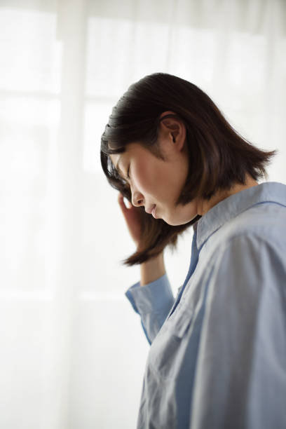 istock depression image of young woman 821212496
