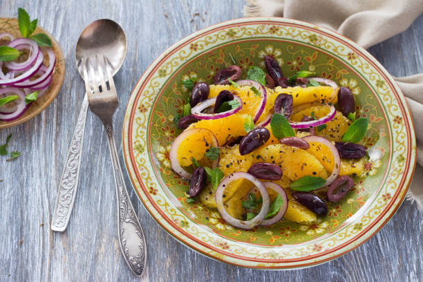 istock Plate with moroccan salad from oranges on a wooden table 821212554