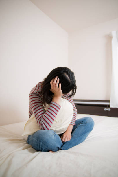 istock depression image of young woman 821212962
