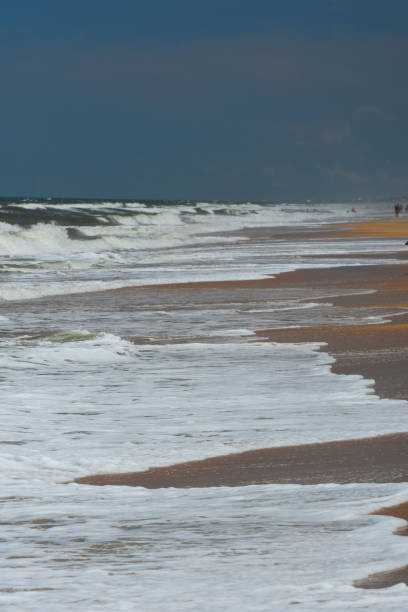 istock Breaking surf washing up Florida beach 821213168