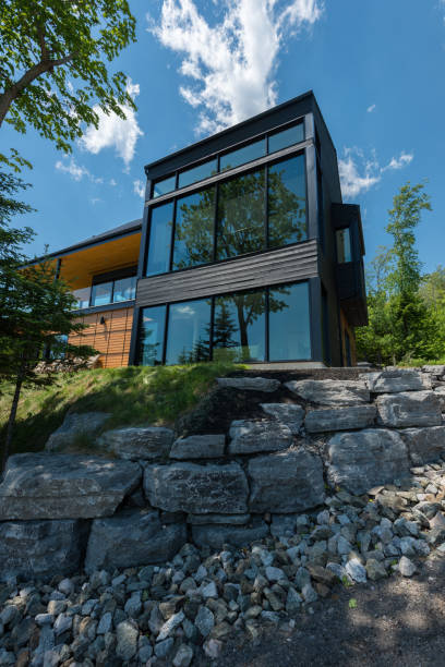 istock Beautiful modern house in the forest. 821224700