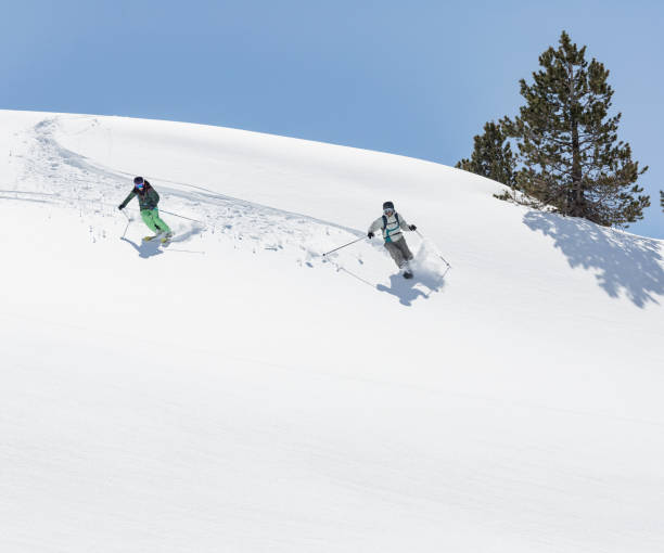 istock Man and woman skiing 821230862