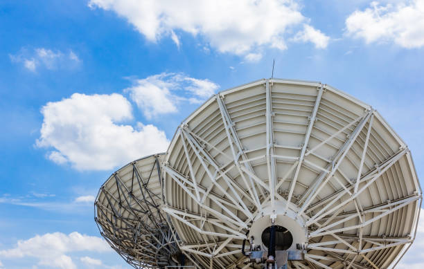 istock picture of parabolic satellite dish space technology receivers 821232116
