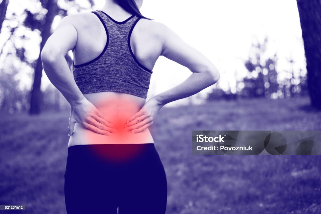 Back injury in training Backache Stock Photo