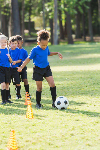 istock African-American girl on soccer team practicing 821234890