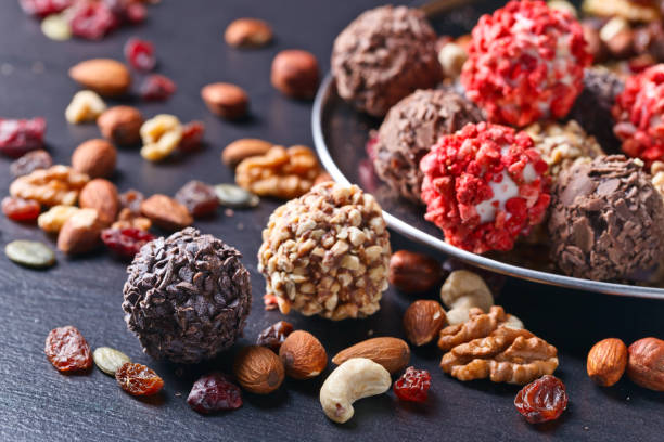 istock Homemade candy with chocolate , nuts and dried strawberry 821235110