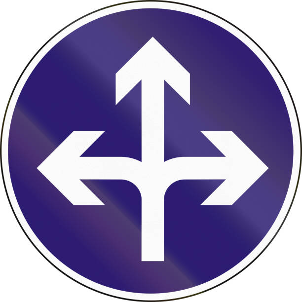 istock Road sign used in Hungary - Turn left, right or straight ahead 821237568