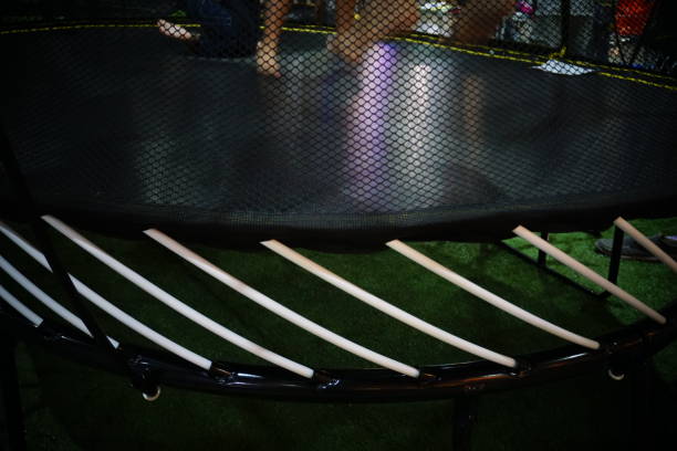istock Little girl jumping on trampoline 821238558