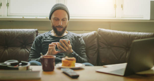 istock Man working on laptop at home 821238832