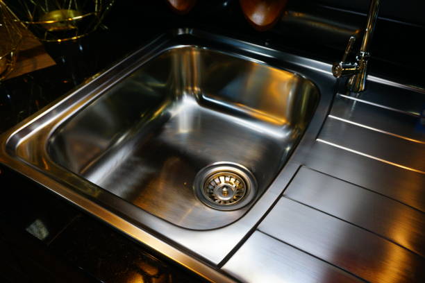 istock Stainless steel sink with mixer tap 821239114
