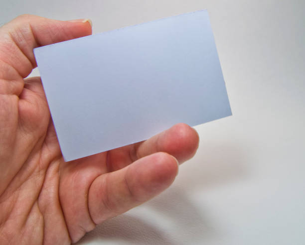 istock man hand holding a gray empty billboard on a white background 821251368