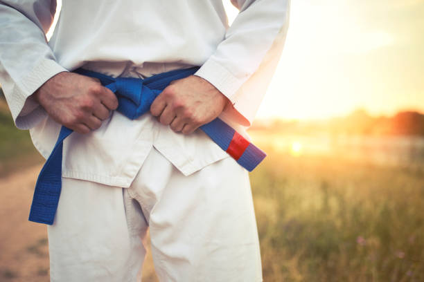 istock Tight blue belt for taekwondo 821257128