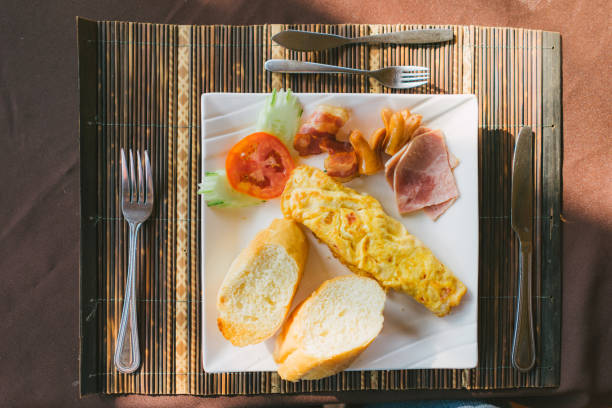 istock English breakfast - eggs, bacon, Ham,  toast with copy space 821257194