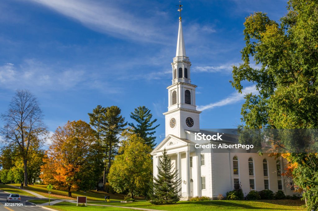 Traditional American White Church and Blue Sky Traditional American White Church with a high Steeple in Williamstown, MA, on a Clear Autumn Day Church Stock Photo