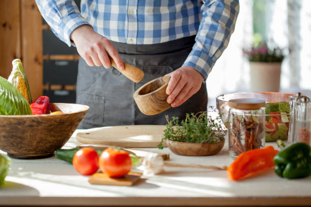 istock male cooking healthy salad 821264358