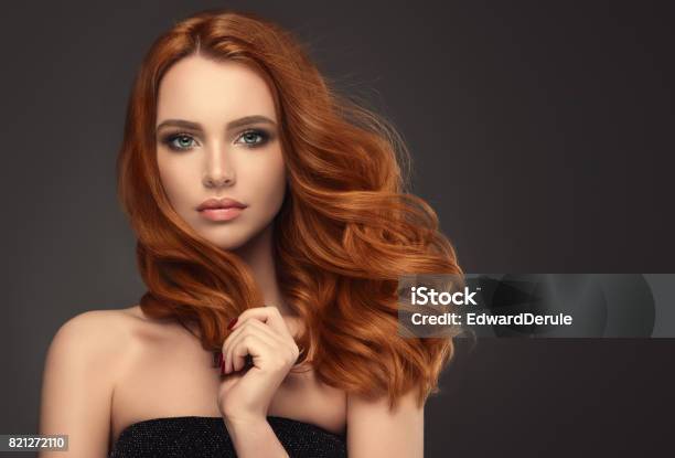 Red Haired Woman With Voluminous Shiny And Curly Hairstyleflying Hair Stock Photo - Download Image Now