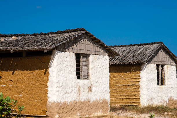 istock Traditional adobe house next to the sea 821274372