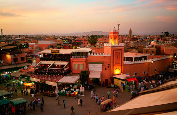 Evening Djemaa El Fna Square with Koutoubia Mosque, Marrakech, Morocco