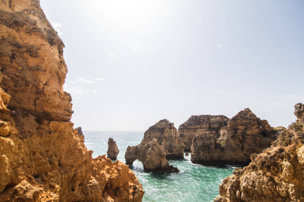 istock Beautiful atlantic ocean view horizon with sandy beach rocks  with stairs on beach on Atlantic ocean in Portugal 821283040