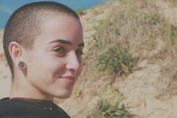 istock Girl with very short hair 821294698