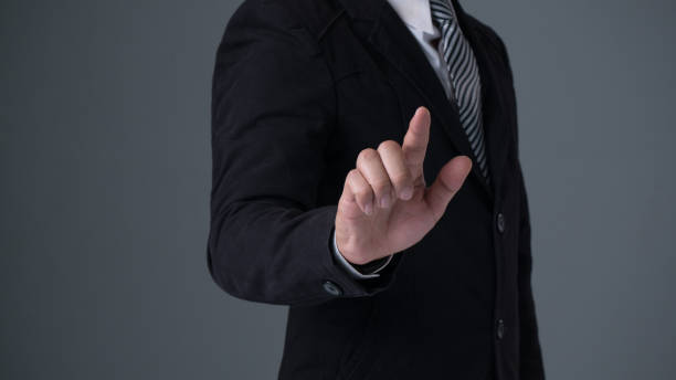 istock Businessman wearing  suite pointing finger 821295760