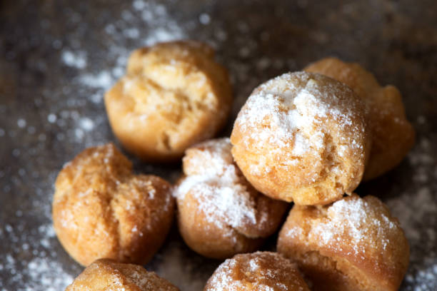istock Homemade small donuts with powdered sugar 821298782