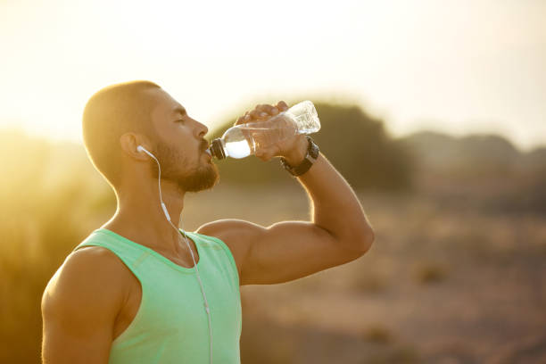 istock Photo of a man drinking water 821302516