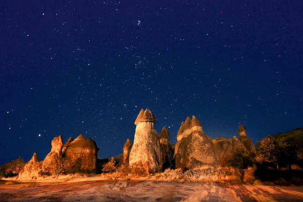 istock Fairy chimneys at night, Cappadocia, Turkey. 821305386