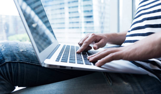 istock Young businessman multitasking using laptop.Business technology lifestyle.working,workplaces 821305398