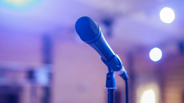 istock Microphone. Microphone on stage. Microphone close-up. A pub. Bar. A restaurant. Classical music. Music 821308678