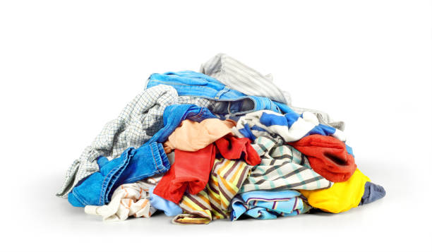 istock Pile of clothes isolated on white background 821309088