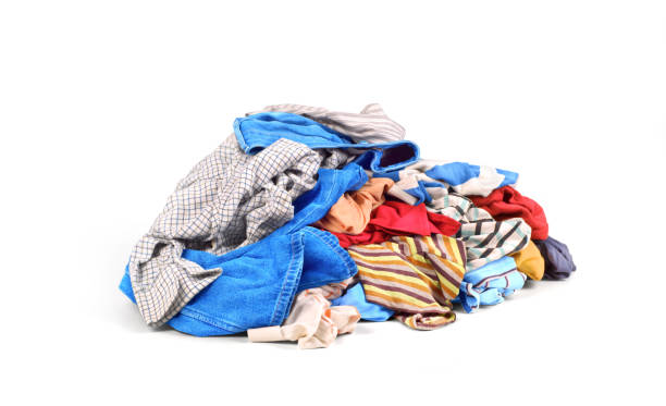 istock Pile of clothes isolated on white background 821309166