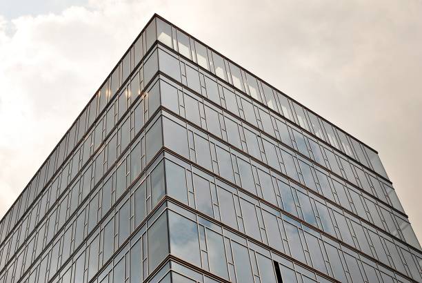 istock Modern building.Modern office building with facade of glass 821327216