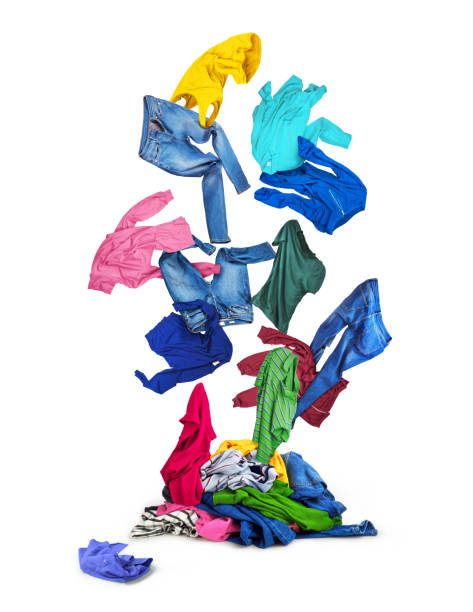 istock Colorful clothes falling on a pile of clothes 821333790