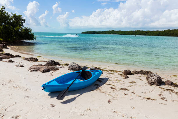 Blue kayak on the Coco Plum Beach, , turquoise colored sea. Florida