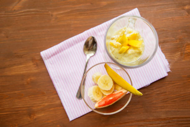 istock Banana smoothie on a rustic wooden table 821347272