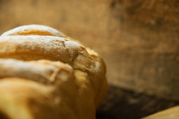 istock White bread on a white towel with milk 821368634